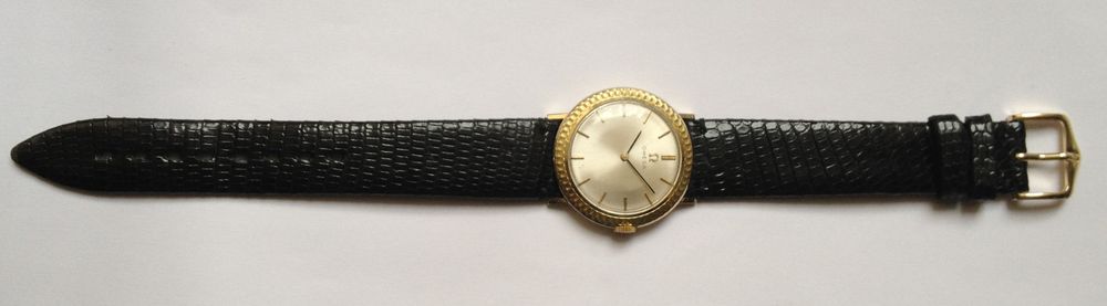 Hodinky OMEGA ultra slim 14kt GOLD 585 - náramkové mechanické - luneta guilosch
