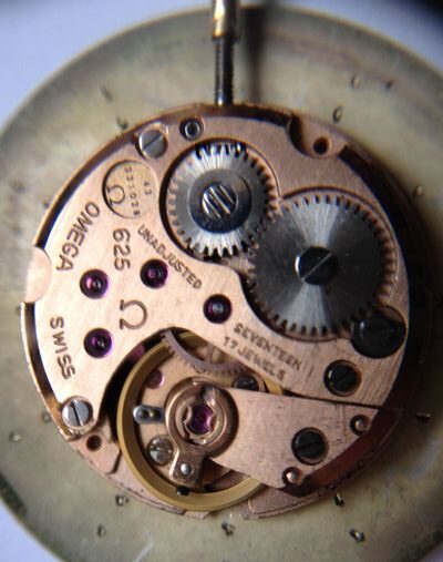 Hodinky OMEGA ultra slim 14kt GOLD 585 - náramkové mechanické - luneta guilosch