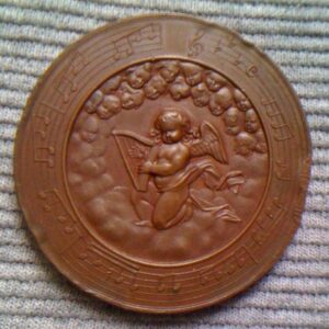 Medaile plastika Andělíček noty